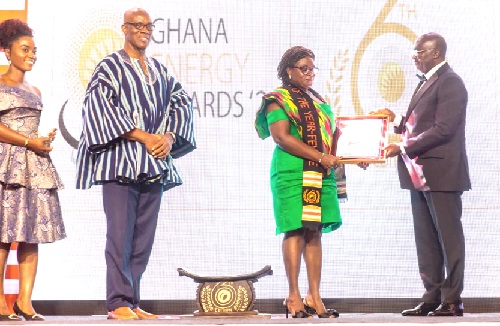 Harriett Amissah-Arthur (2nd from right) recieving her award Harriett Amissah-Arthur (2nd from right) recieving her award