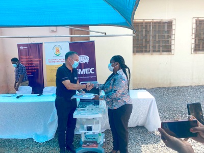 Jose Fernandes, West African Manager of SMEC (left) handing over documents to the machine to Dr Esther Odame-Asiedu, Ga Central Municipal Director of Health. Jose Fernandes, West African Manager of SMEC (left) handing over documents to the machine to Dr Esther Odame-Asiedu, Ga Central Municipal Director of Health.