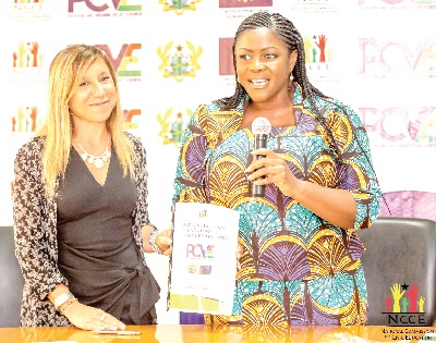 Kathleen Addy (right), Chairperson of the NCCE, and Anna Lixi, Head of Security and Governance of the EU Delegation to Ghana, displaying the signed PCVE agreement Kathleen Addy (right), Chairperson of the NCCE, and Anna Lixi, Head of Security and Governance of the EU Delegation to Ghana, displaying the signed PCVE agreement