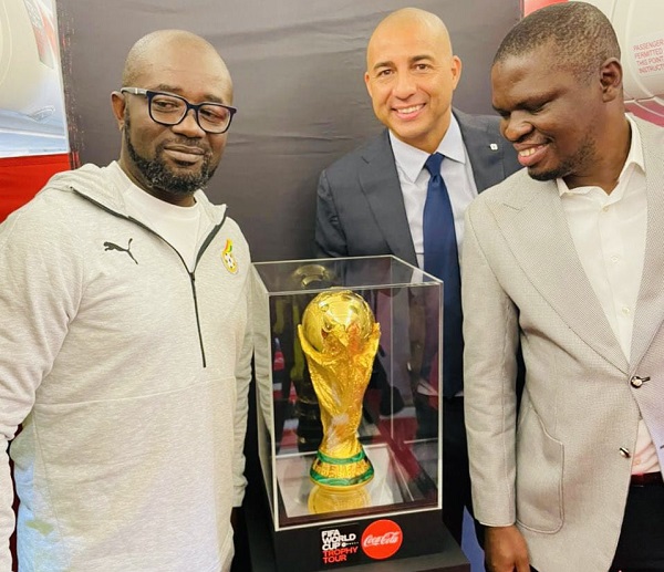 From L-R: Kurt Okraku, GFA President; David Trezeguet and Mustapha Ussif, Sports Minister posing with the World Cup trophy. From L-R: Kurt Okraku, GFA President; David Trezeguet and Mustapha Ussif, Sports Minister posing with the World Cup trophy.