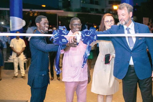 Patrick Asiamah (left), CEO, SYNLAB Ghana, Dr Hafez Adam (2nd from left), Director of External Health Cooperation at the Ministry of Health, cutting the tape with some officials of SYNLAB to officially open the new head office Patrick Asiamah (left), CEO, SYNLAB Ghana, Dr Hafez Adam (2nd from left), Director of External Health Cooperation at the Ministry of Health, cutting the tape with some officials of SYNLAB to officially open the new head office