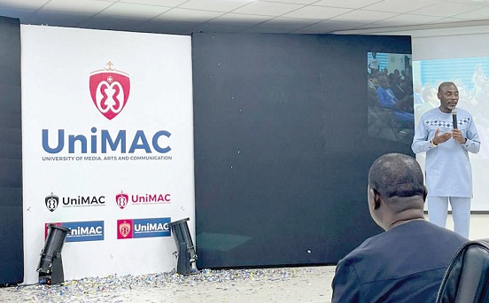 Prof. Kwamena Kwansah-Aidoo (standing), acting Vice-Chancellor of the UniMAC, addressing the gathering after unveiling the logo Prof. Kwamena Kwansah-Aidoo (standing), acting Vice-Chancellor of the UniMAC, addressing the gathering after unveiling the logo