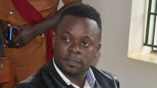 Prophet Kintu Dennis was allegedly seen in a widely circulating video beating some of the congregants Prophet Kintu Dennis was allegedly seen in a widely circulating video beating some of the congregants