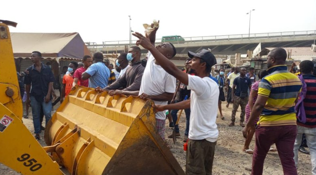 Traders at "Maame Dokuno - VVIP" enclave protested their eviction by the "Operation Clean Your Frontage," campaign led by the Greater Accra Regional Minister, Mr Henry Quartey, bringing the exercise to a halt momentarily. Traders at "Maame Dokuno - VVIP" enclave protested their eviction by the "Operation Clean Your Frontage," campaign led by the Greater Accra Regional Minister, Mr Henry Quartey, bringing the exercise to a halt momentarily.