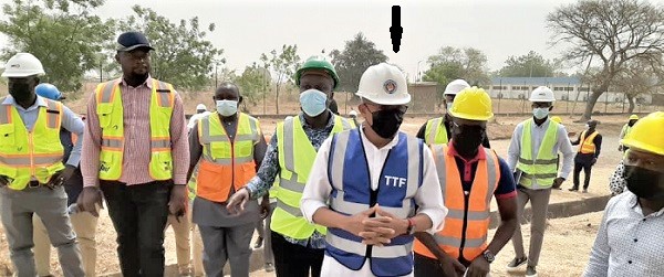 Dr Mustapha Abdul-Hamid (arrowed), CEO of NPA, making a point during a visit to the BOST depot at Bolgatanga