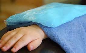 Should I apply ice or heat to an injury?