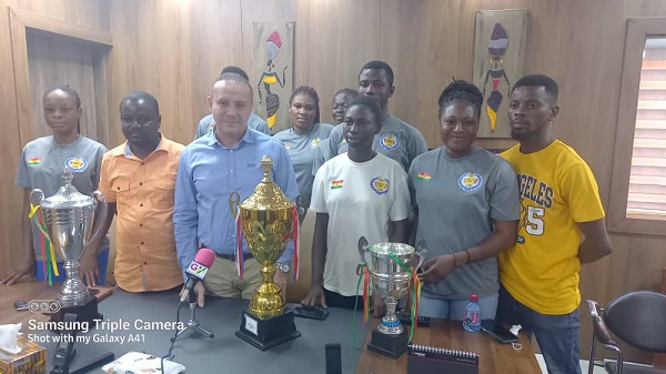 Mr Nazem Karroum(3rd from left), Chairman of Samir Engineering and Trading Company Limited, with members of El-Wak Wings Volleyball Club