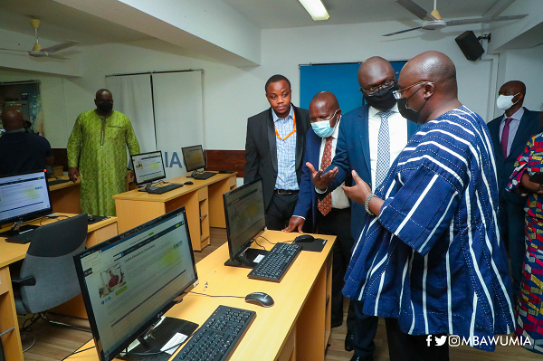 Mr James Boakye (2nd from right), Executive Director of the Leyden Educational Foundation, briefing Vice-President Dr Mahamudu Bawumia (right) during the inspection of the Integrated Online Centre at the University of Ghana after the launch Mr James Boakye (2nd from right), Executive Director of the Leyden Educational Foundation, briefing Vice-President Dr Mahamudu Bawumia (right) during the inspection of the Integrated Online Centre at the University of Ghana after the launch