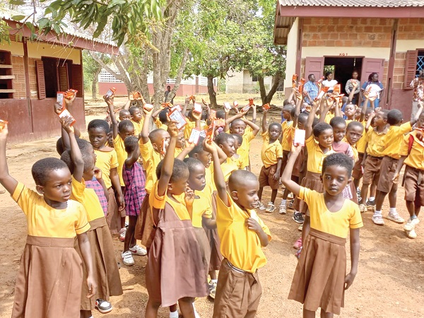 Schoolchildren displaying their chocolates Schoolchildren displaying their chocolates