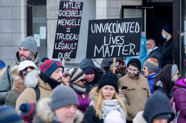 People take part in a demonstration against the Quebec government’s measures to curb the spread of COVID-19 in Montreal, Saturday, Jan. 8, 2022. THE CANADIAN PRESS/Graham Hughes People take part in a demonstration against the Quebec government’s measures to curb the spread of COVID-19 in Montreal, Saturday, Jan. 8, 2022. THE CANADIAN PRESS/Graham Hughes