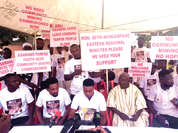 •Mr Kwadwo Nti (seated 2nd from right), the Organiser of the youth group, addressing media practitioners at Asamang-Tamfoe on Tuesday while some members hold placards with different inscriptions. •Mr Kwadwo Nti (seated 2nd from right), the Organiser of the youth group, addressing media practitioners at Asamang-Tamfoe on Tuesday while some members hold placards with different inscriptions.