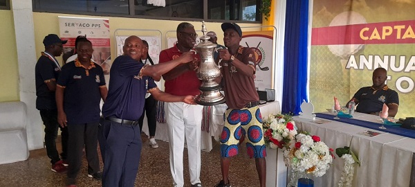 Mr Appiah (far left) being assisted by Mr Mike Aggrey, the GGA president, to present the winner’s trophy to James Akwaboah (right). Mr Appiah (far left) being assisted by Mr Mike Aggrey, the GGA president, to present the winner’s trophy to James Akwaboah (right).