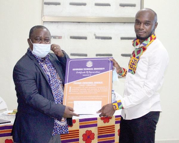 Professor David Kofi Essumang (left), Vice-Chancellor of KTU, presenting the award citation to Pacome Emmanuel Damalie, a Daily Graphic reporter Professor David Kofi Essumang (left), Vice-Chancellor of KTU, presenting the award citation to Pacome Emmanuel Damalie, a Daily Graphic reporter