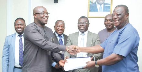 Kwasi Amoako-Atta (right), Minister of Roads and Highways, exchanging the contract document with Oliver Acquah, Chief Executive Officer, First Sky Limited Kwasi Amoako-Atta (right), Minister of Roads and Highways, exchanging the contract document with Oliver Acquah, Chief Executive Officer, First Sky Limited