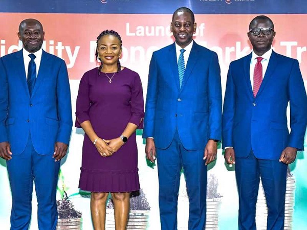 Akwasi Adu-Boahene (left), Head, Fidelity Securities Ltd., Solace Fiadjoe (2nd from left), Head, Financial Institutions Group, Rev. Daniel Ogbarmer Tetteh, (2nd from right), Director General of SEC, and Edward Opare-Donkor (right), Fidelity Securities Limited Fidelity Money Market Trust outdoored - Aims to meet investors recurrent needs