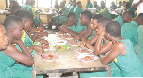 Students at the Jema Senior High School enjoying their lunch during the visit of some members of PIAC to the school last Wednesday Students at the Jema Senior High School enjoying their lunch during the visit of some members of PIAC to the school last Wednesday