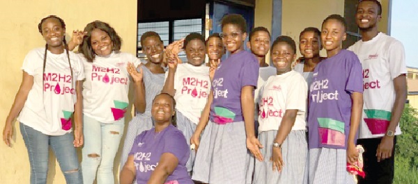 Elizabeth Konadu-Boakye (left), founder of Gyabs Foundation, with some students of St. Johns Grammer Senior High School after the programme Elizabeth Konadu-Boakye (left), founder of Gyabs Foundation, with some students of St. Johns Grammer Senior High School after the programme