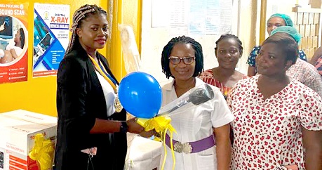 Nana Aba Asobu Sagoe (left), President of the Rotary Club of Accra-Sunrise, handing over the medical examination lamp to Vivian Gbekle (middle), Head of Nursing and Midwifery at the Adabraka Polyclinic Nana Aba Asobu Sagoe (left), President of the Rotary Club of Accra-Sunrise, handing over the medical examination lamp to Vivian Gbekle (middle), Head of Nursing and Midwifery at the Adabraka Polyclinic