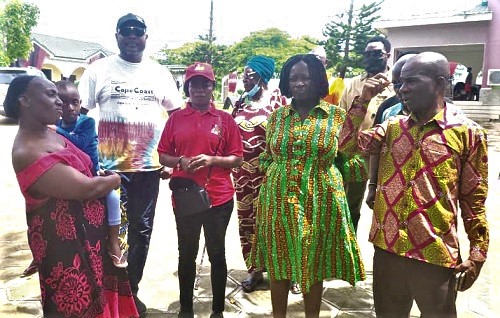 Prof. Naana Jane Opoku-Agyemang (2nd from right) holding discussion with some of the victims