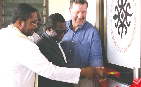 Prof. Samuel Kwame Offei (middle), Board Chairman, The Sanneh Institute, cutting a tape to inaugurate the multi-religious library. Assisting him are Dr Chris Seiple (right), President Emeritus, Institute of Global Engagement, and the Very Rev. Gabriel Kojovi Liashiedzi, Executive Secretary, Department of Pastoral Ministry and Evangelisation, Ghana Catholic Bishops Conference. Picture: MAXWELL OCLOO Prof. Samuel Kwame Offei (middle), Board Chairman, The Sanneh Institute, cutting a tape to inaugurate the multi-religious library. Assisting him are Dr Chris Seiple (right), President Emeritus, Institute of Global Engagement, and the Very Rev. Gabriel Kojovi Liashiedzi, Executive Secretary, Department of Pastoral Ministry and Evangelisation, Ghana Catholic Bishops Conference. Picture: MAXWELL OCLOO
