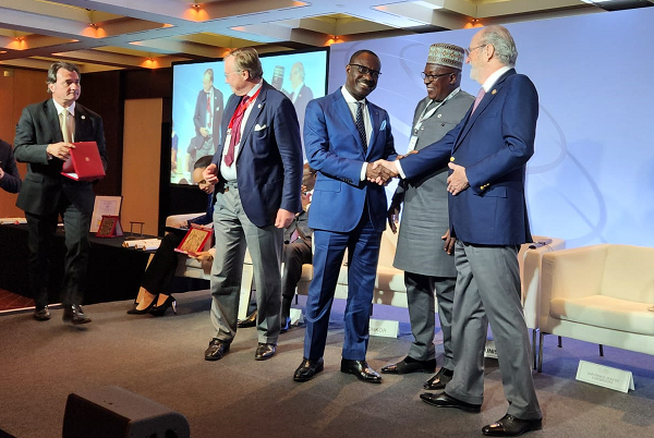 Dr Agyekum Donkor in a warm handshake with Jean Paul Carteron 