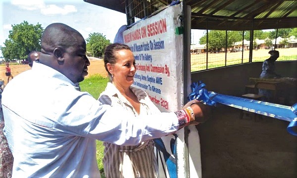 Anne-Sophie Ave, the French Ambassador to Ghana, together with Kingsley Ofosu Ntiamoah, Executive Director of the GMMB, cutting the tape to inaugurate the newly constructed hands on session building attached to the museum