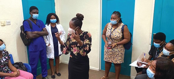 An Audiologist speaking to medical students on safe listening. An Audiologist speaking to medical students on safe listening.
