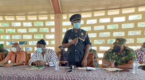 COP Timothy Yoosa Bonga (standing), Northern Regional Police Commander, speaking at the stakeholders' dialogue. With him are Mr Shani Alhassan Shaibu (2nd from left), Northern Regional Minister, and other members of the regional security council COP Timothy Yoosa Bonga (standing), Northern Regional Police Commander, speaking at the stakeholders' dialogue. With him are Mr Shani Alhassan Shaibu (2nd from left), Northern Regional Minister, and other members of the regional security council
