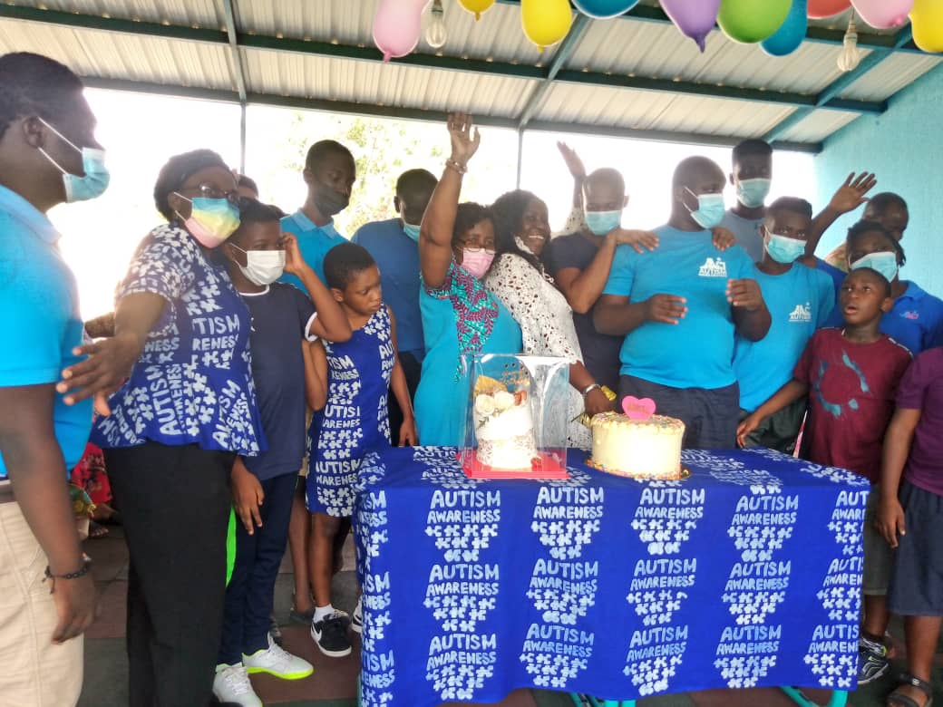 Some staff and students at the Autism Care and Training join Mrs Phlenge (middle) to cut a cake Some staff and students at the Autism Care and Training join Mrs Phlenge (middle) to cut a cake