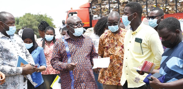 Dr Kwaku Afriyie (middle) Minister of Environment,Science, Technology and Innovation (MESTI), interacting with some executive members of Kpone Plastic Waste Collectors Association during his tour. Pictures: EBOW HANSON Dr Kwaku Afriyie (middle) Minister of Environment,Science, Technology and Innovation (MESTI), interacting with some executive members of Kpone Plastic Waste Collectors Association during his tour. Pictures: EBOW HANSON