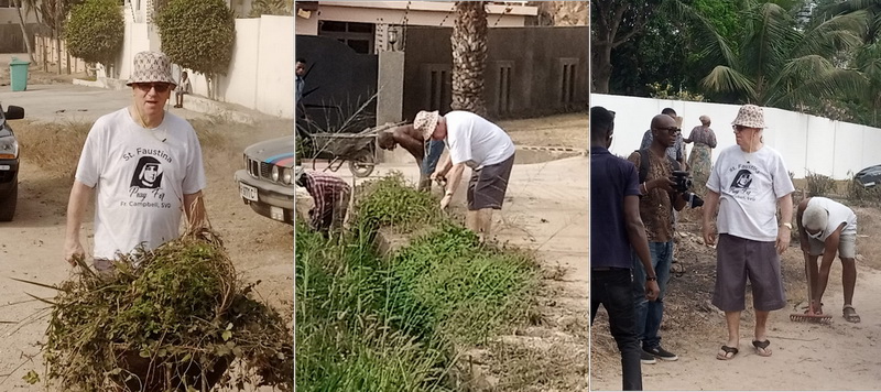 Rev. Father Campbell, Lower McCarthy Hill residents hold clean up