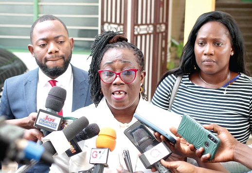 Patricia Adusei-Poku (middle), Executive Director, Data Protection Commission, addressing the press. PICTURE: MAXWELL OCLOO