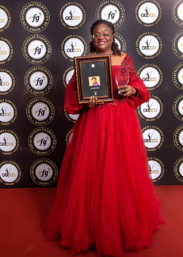 Patience Akyianu displaying the award. Patience Akyianu displaying the award.