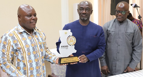 Joseph Cudjoe (left), Minister of Public Enterprises, and Edward Boateng (middle), Director General of State Interest and Governance Authority, displaying the plaque after it was unveiled. With them is Edward Borteye (far right), Head of Public Entities and Asset Division Unit of the Ministry of Finance. Picture: GABRIEL AHIABOR Joseph Cudjoe (left), Minister of Public Enterprises, and Edward Boateng (middle), Director General of State Interest and Governance Authority, displaying the plaque after it was unveiled. With them is Edward Borteye (far right), Head of Public Entities and Asset Division Unit of the Ministry of Finance. Picture: GABRIEL AHIABOR