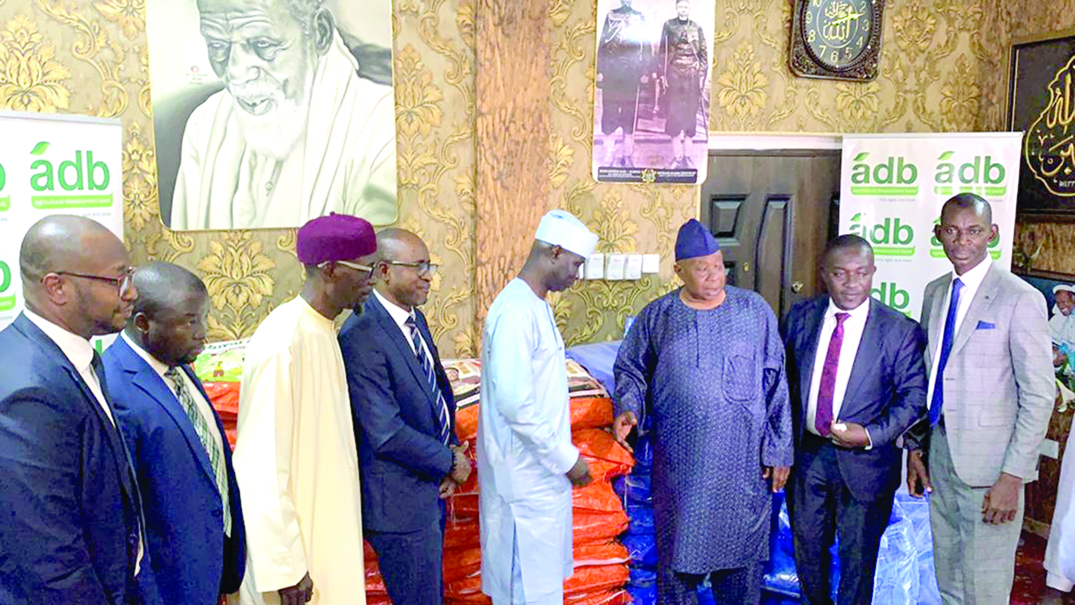 Alhaji Alhassan Yakubu-Tali (fifth left), Deputy MD, ADB, presenting the items to representatives of the National Chief Imam, Dr Sheikh Osmanu Nuhu Sharubutu, in Accra