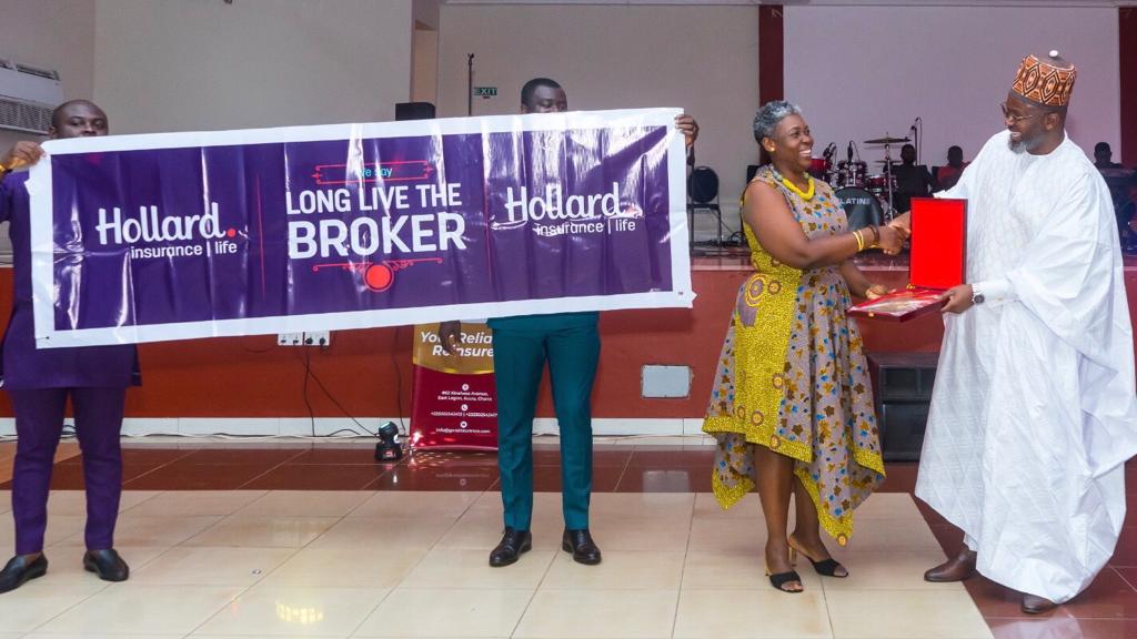 Shaibu Ali (right), President, IBAG presenting an award to Maame Efua Sackitey–Williams, Head of Broker Market, Hollard Insurance. Hollard partners IBAG to create more awareness