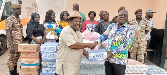 Henry Harding (left) presenting the items to Rev. Fr Martin Padi, the Deputy Director of Prisons, at the Nsawam Medium Security Prison Henry Harding (left) presenting the items to Rev. Fr Martin Padi, the Deputy Director of Prisons, at the Nsawam Medium Security Prison