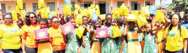 Some girls of the R.C. Girls’ Basic School, Ho, holding their sanitary kits. With them are some of the organisers Some girls of the R.C. Girls’ Basic School, Ho, holding their sanitary kits. With them are some of the organisers