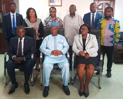 Osei Kyei-Mensah-Bonsu (seated middle), the Minister of Parliamentary Affairs, with other members of the entity tender committee of the ministry after the inauguration. Picture: SAMUEL DUODU