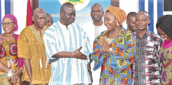 Dr Hafiz Bin Salih (3rd from left), Upper West Regional Minister, interacting with Fatimatu Abubakar, Deputy Minister of Information, after the press conference. With them are members of a delegation from the Upper West Region. Picture: Maxwell Ocloo