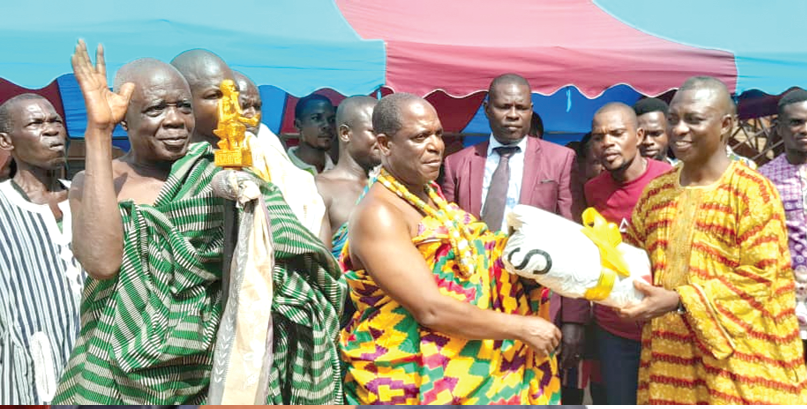Dr Edward Ayimey (right), Director of Quality Assurance at the Ho Technical University, presenting a citation of honour to Togbe Dzegblade IV, the Chief of Adaklu Kodzobi Dr Edward Ayimey (right), Director of Quality Assurance at the Ho Technical University, presenting a citation of honour to Togbe Dzegblade IV, the Chief of Adaklu Kodzobi