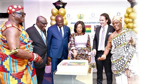 FROM LEFT: Nana Owusu Sekyere, Twafuorhene of UK & Ireland, Papa Owusu-Ankomah, Ghana High Commissioner to UK and Republic of Ireland, Kwaku Ampratwum-Sarpong, Deputy Minister for Foreign Affairs and Regional Integration and MP for Mampong, Shirley Ayorkor Botchwey, Minister for Foreign Affairs and Regional Integration, Nidal Kamouni, CEO, Access Group, Nana Amonoo Gyamfuah Debrah, Asantefuohemaa of UK & Ireland, cutting the cake to officially open the centre FROM LEFT: Nana Owusu Sekyere, Twafuorhene of UK & Ireland, Papa Owusu-Ankomah, Ghana High Commissioner to UK and Republic of Ireland, Kwaku Ampratwum-Sarpong, Deputy Minister for Foreign Affairs and Regional Integration and MP for Mampong, Shirley Ayorkor Botchwey, Minister for Foreign Affairs and Regional Integration, Nidal Kamouni, CEO, Access Group, Nana Amonoo Gyamfuah Debrah, Asantefuohemaa of UK & Ireland, cutting the cake to officially open the centre