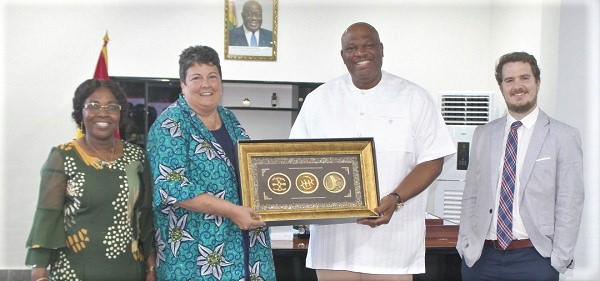 Henry Quartey (2nd from right), Greater Accra Regional Minister, presenting a gift to Virginia E. Palmer, the US Ambassador to Ghana. With them are Felicia Dapaah (left), Chief Director of the Greater Accra Regional Coordinating Council, and Chris Pery (right), Political Officer at the US Embassy . Picture: ESTHER ADJORKOR ADJEI Henry Quartey (2nd from right), Greater Accra Regional Minister, presenting a gift to Virginia E. Palmer, the US Ambassador to Ghana. With them are Felicia Dapaah (left), Chief Director of the Greater Accra Regional Coordinating Council, and Chris Pery (right), Political Officer at the US Embassy . Picture: ESTHER ADJORKOR ADJEI