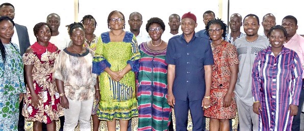 Prof. Dzodzi Tsikata (4th from left), Principal Investigator, ISSER, University of Ghana, with Dr Fred Dzanku (2nd from right), Researcher; Dr Getrude Dzifa Torvikey (right), Research Fellow, University of Ghana, and some participants after the seminar. Picture: ELVIS NII NOI DOWUONA