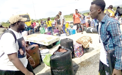 The students with their luggage getting ready to move into their various communities The students with their luggage getting ready to move into their various communities
