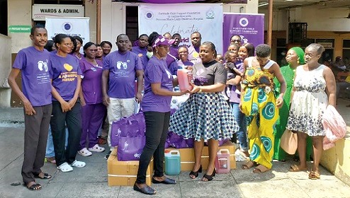 Evelyn Duah (left), Executive Director of the Fortitude Child Support Foundation, presenting the items to Dr Margaret Neizer, Head of Clinical Services at the Princess Marie Louise Children's Hospital in Accra. With them are some members of the foundation and nursing mothers Evelyn Duah (left), Executive Director of the Fortitude Child Support Foundation, presenting the items to Dr Margaret Neizer, Head of Clinical Services at the Princess Marie Louise Children's Hospital in Accra. With them are some members of the foundation and nursing mothers