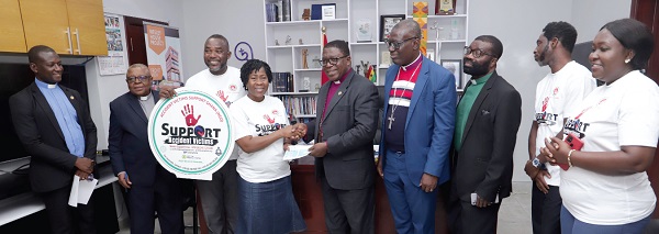 Most Rev. Dr Paul Kwabena Boafo (5th from right), Presiding Bishop of the Methodist Church, presenting the cheque for GH¢10,000 to the Accident Victims Support Foundation in Accra. Picture: SAMUEL TEI ADANO Most Rev. Dr Paul Kwabena Boafo (5th from right), Presiding Bishop of the Methodist Church, presenting the cheque for GH¢10,000 to the Accident Victims Support Foundation in Accra. Picture: SAMUEL TEI ADANO