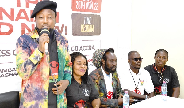  Nana Ntow, Convenor of the Human Rights Ambassadors, delivering his address to mark World Children’s Day. With him are some of the ambassadors. Picture: EBOW HANSON
