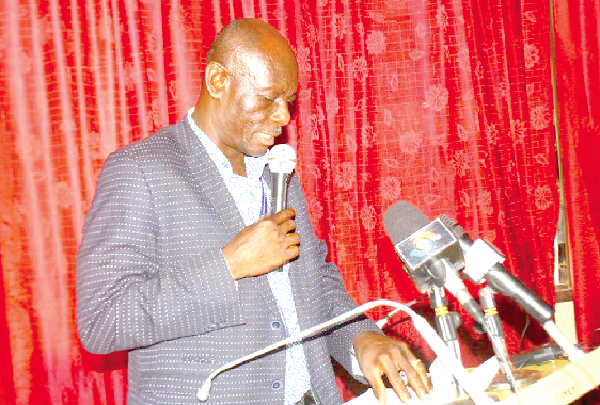 Kofi Obeng Ayirebi , National Chairman of the Quantity Surveying Division of the GhIS, swearing in the new regional executive Standardisation of building materials necessary — Ghana Institute of Surveyors