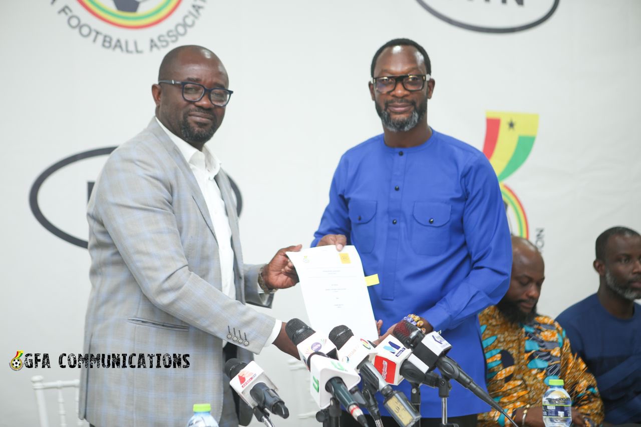 Kurt Okraku, GFA President exchanging the partnership agreement with Selorm Adadevoh, the Chief Executive Officer (CEO) of MTN Ghana.